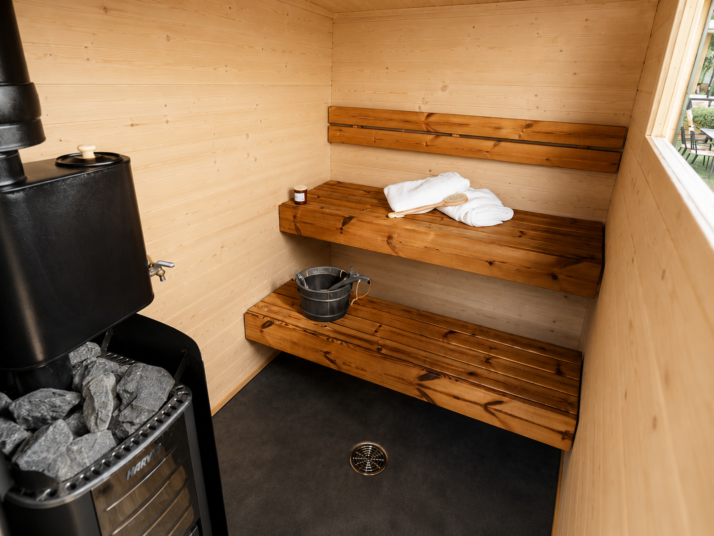 Proper Finnish Sauna carousel - actual interior proof photo Actual sauna room with timber benches, stones and water bucket